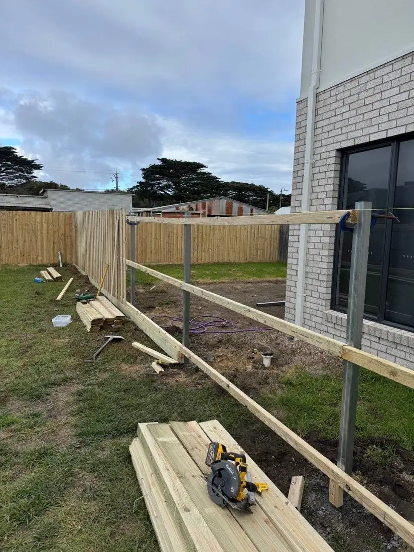 Fence installation in Geelong — galvanised steel posts with timber rails